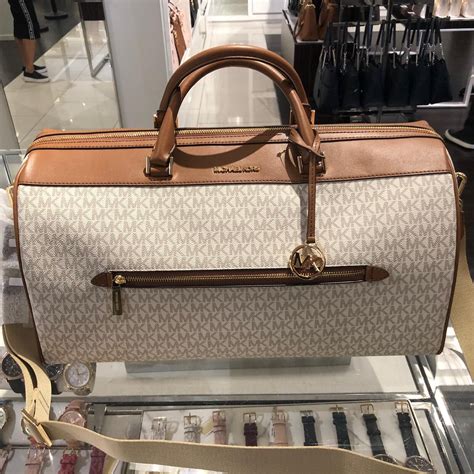 michael kors small duffel|Michael Kors suitcase.